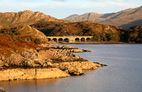 The 18.15 Mallaig to Fort William heads over Loch Nan Uamh viaduct on 23.9.20.