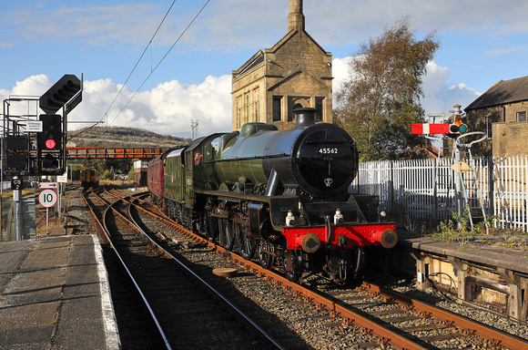 45562 arrives back into Carnforth from Scarborough .