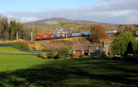 90037 & 90024 head away from Carnforth on 4.11.20 with 4M25 Mossend to Daventry.