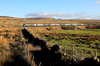 390043 climbs past Shap wells on 13.1.22 with 1S52 10.30 London Euston to Glasgow Central.