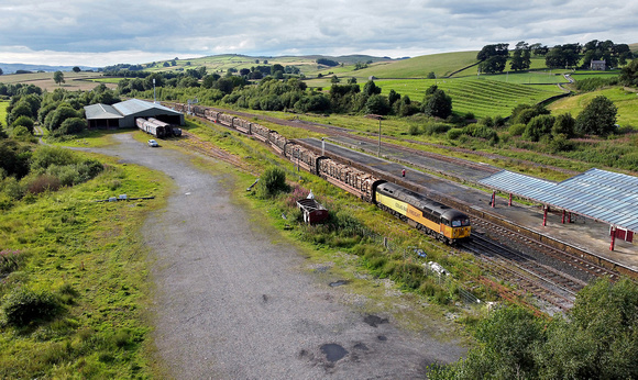 56096 shunts at Hellifield on 24.7.23 with the Hellifield to Chirk logs.