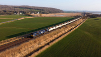 66424 passes Crag Foot on 20.3.22 with a Mountsorrell to Sellafield train.