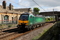93001 passes Carnforth on 10.6.25  with 0Q72 0853 Carlisle to Wembley H.S