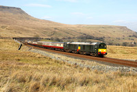 D8096 and D8107  work pass Ais Gill on 8.3.25 with SRPS's "The Seven Counties Rambler"  from Linlithgow.