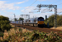 66303 & 66431 pass Hest Bank on 24.9.22 with the Tesco Express.
